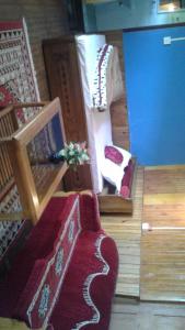 Posezení v ubytování Vamoose Olive Homestay Aritar