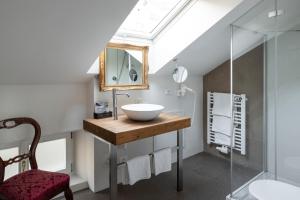 Koupelna v ubytování Villa Bergmann Suites Meran + 51 fotografií