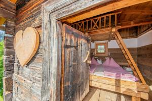 Łóżko lub łóżka w pokoju w obiekcie Appartement Arnoldgut