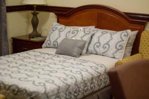 Llit o llits en una habitació de Malabi Exclusive Lodges