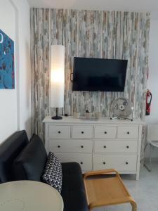 TV a/nebo společenská místnost v ubytování In Bed with Lisbon 8N