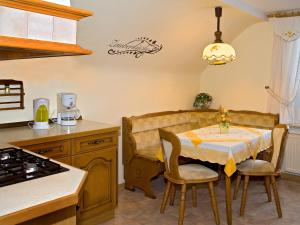 Kuchyň nebo kuchyňský kout v ubytování Panoramaferienwohnung Bergwiese + 24 fotografií