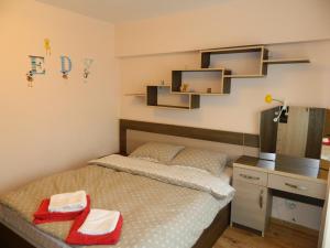 Кровать или кровати в номере Apartament Antonia