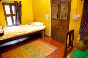 Postel nebo postele na pokoji v ubytování Ram Bhawan Residency