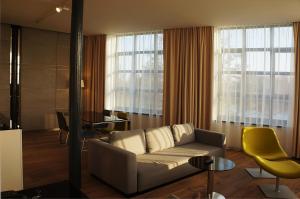 Posezení v ubytování Fabryka Wełny Hotel & Spa