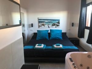 Cama o camas de una habitación en Suites D'Elice