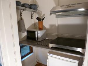 Кухня или мини-кухня в Huis De Roos
