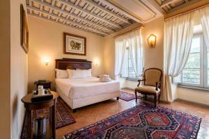 Postel nebo postele na pokoji v ubytování Hotel Terme di Stigliano