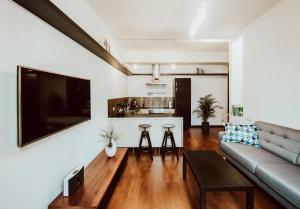 Televízia a/alebo spoločenská miestnosť v ubytovaní Apartament ST2 + 6 fotografií
