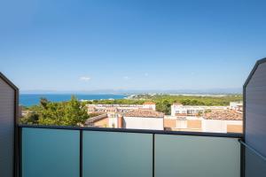 a balcony with a view of the ocean at htop Molinos Park #htopEnjoy in Salou
