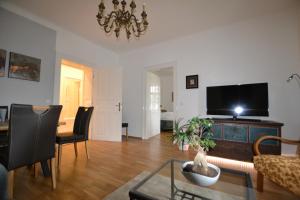 TV a/nebo společenská místnost v ubytování Apartment Graz-Ulrichsbrunn, free parking