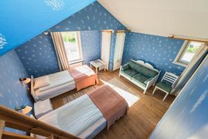 Postel nebo postele na pokoji v ubytování Brudhäll Hotel & Restaurant