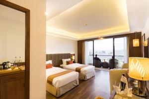 Letto o letti in una camera di Mountain Glory Forest Resort