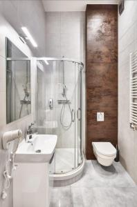 Ванная комната в Royal Aparthotel Piotrkowska 116