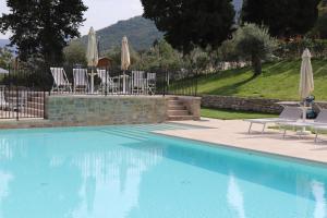 Bazén v ubytování Borgo di Villa Cellaia Resort & SPA nebo v jeho okolí
