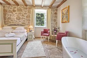 Кровать или кровати в номере Villa Princess Captislava