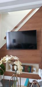 TV at/o entertainment center sa Julzhome PH Properties by Juliet AfricaPervaze