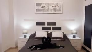 Ένα ή περισσότερα κρεβάτια σε δωμάτιο στο Apartamento Any