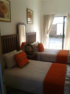 Postel nebo postele na pokoji v ubytování Karoo View Guesthouse Cradock