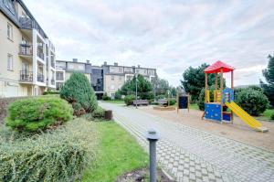 Plac zabaw dla dzieci w obiekcie Dom & House - Apartments Parkur Sopot