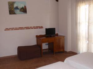 TV a/nebo společenská místnost v ubytování Hotel Casa Beletri