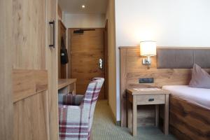 Postel nebo postele na pokoji v ubytování Hotel Glöckner und Hotel Residenz Glöckner