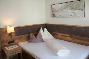 Postel nebo postele na pokoji v ubytování Hotel Glöckner und Hotel Residenz Glöckner