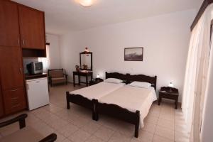Voodi või voodid majutusasutuse Hotel Melikari toas