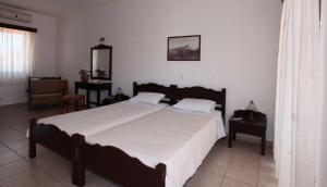 Voodi või voodid majutusasutuse Hotel Melikari toas