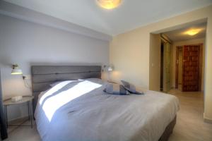 Postel nebo postele na pokoji v ubytování Casa Almendros
