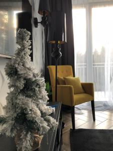 Posedenie v ubytovaní Family & Business Sauna Apartments No1 Leśny nad Zalewem Cedzyna Unikat - 3 Bedroom with Private Sauna, Bath with Hydromassage, Terrace, Garage, Catering Options