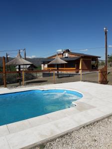 Het zwembad bij of vlak bij Cabañas Mi Capricho
