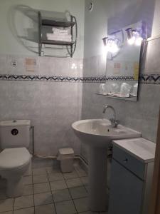 Koupelna v ubytování Hotel Le Beauregard