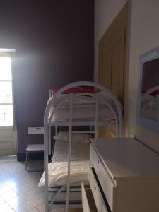 Postel nebo postele na pokoji v ubytování Sunshine Hostel Palermo