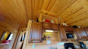 Kuchyň nebo kuchyňský kout v ubytování White Pine Cabin by Canyonlands Lodging