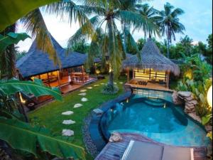 an image of a villa with a swimming pool at Villa Bhuvana with private swimming pool in Gili Trawangan