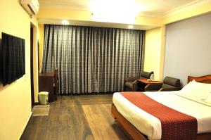 Voodi või voodid majutusasutuse Tibet Guest House toas