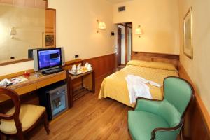 TV a/nebo společenská místnost v ubytování Hotel Oxford