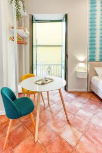 A bed or beds in a room at Mythos Holidays