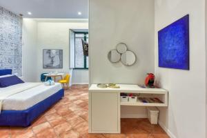 A bed or beds in a room at Mythos Holidays
