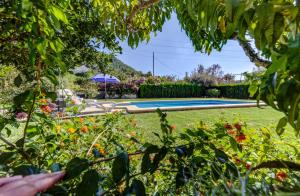 A garden outside Villa Es Coste Rafal By SunVillas Mallorca