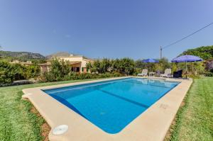 The swimming pool at or close to Villa Es Coste Rafal By SunVillas Mallorca