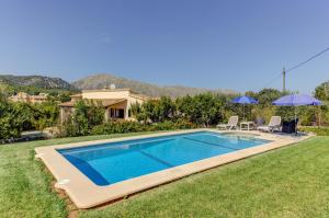 The swimming pool at or close to Villa Es Coste Rafal By SunVillas Mallorca