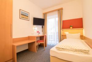 Posteľ alebo postele v izbe v ubytovaní Hotel Gasthof Stefansbrücke