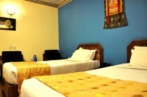 Voodi või voodid majutusasutuse Tibet Guest House toas