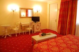 TV a/nebo společenská místnost v ubytování Hotel Motel Gold