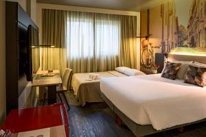 Cama ou camas em um quarto em Novotel Curitiba Batel mais 37 fotos