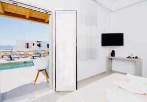 TV a/nebo společenská místnost v ubytování Aeris suites