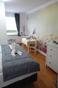 Postel nebo postele na pokoji v ubytování Stern Hotel