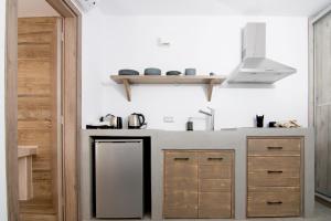 Kuchyň nebo kuchyňský kout v ubytování Aeris suites